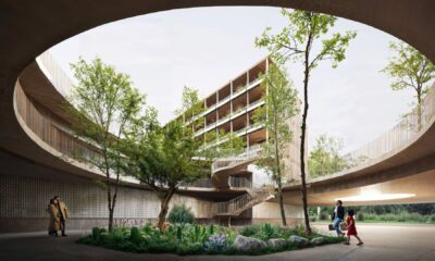 Arhitektonski render kompleksa Sa Casa na Ibizi – drvena zgrada s zelenim balkonima, spiralnim betonskim stubištem i pješačkom stazom kroz sadnice kaktusa i cvijeća u prizemlju